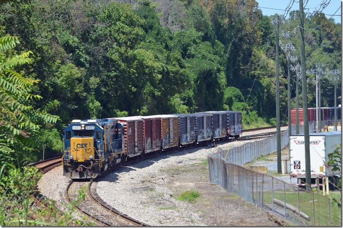 The local is working off Waugh passing siding. CSX 6493. View 2. Big Island VA.