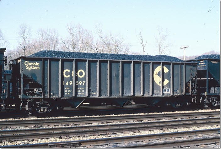 C&O hopper 149597 Shelby KY. 04-15-1996. 160,000 capy, blt 1959, reblt 1975, ex-Elgin, Joliet & Eastern, nee-Pittsburgh & Lake Erie (?). Reblt by Penn Central at Holidaysburg Car Shop.