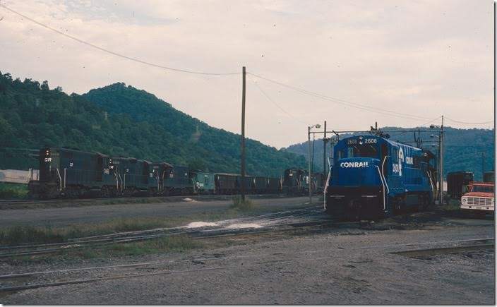 CR 7466 backs into the yard past freshly painted U25B 2608 at the Dickenson engine terminal.