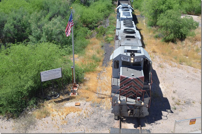 The “Jake” Jacobson Bridge of Unity commemorates a local girl who championed respect, compassion and forgiveness between ethnic, religions and political groups. Jacobson, the well-known manager of Copper Basin Ry., gave the eulogy at her death in 2000. The new highway bridge crosses the old, narrow bridge across the Gila River which is now used as a walking trail. CBRY 302-501. Kelvin AZ.