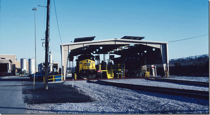 C40-8W 7824 gets checked in CSX’s “Load Evaluation Center.” 11-21-1993. CSX Corbin KY.