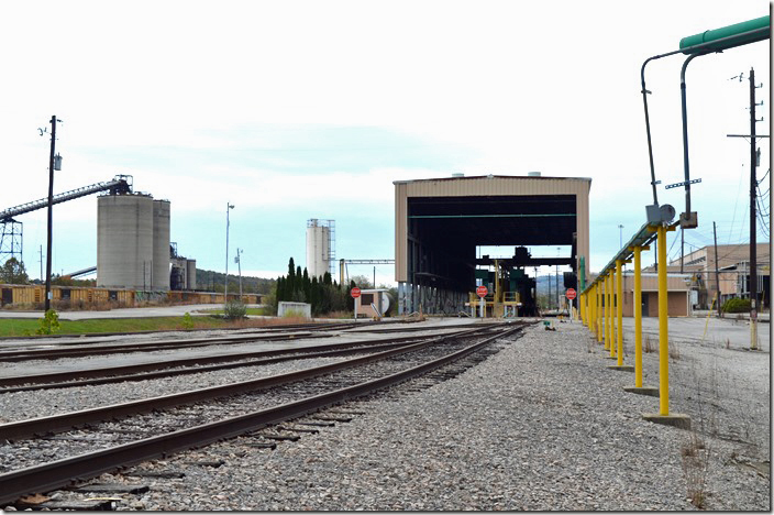 Inactive engine service building, east yard full of stored boxcars and the inactive former USS preparation plant. CSX Corbin KY.