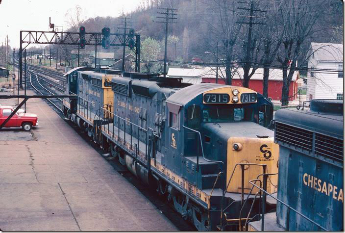 The coal hump SD18s pull by. RU Cabin. 