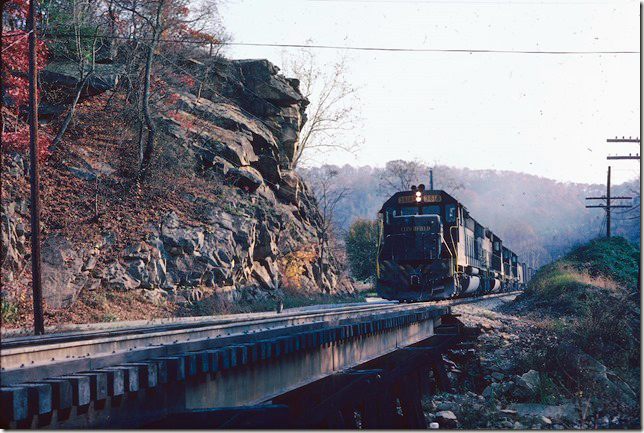 SD45-2 3618-3610-915-2009 bring #95 n/b at Hamlin VA, on 10-30-1977.