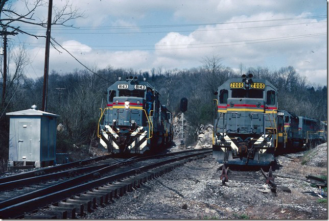 L&N 8143-3579-1293-1259 traverses the new connection southbound between the N&W’s Clinch Valley District and the CRR. The L&N coal train originated at Loyall KY, and will likely leave its train at Castle storage track, a couple miles south. Parked on the “Lumber siding” is power for these coal trains. 03-27-1982.