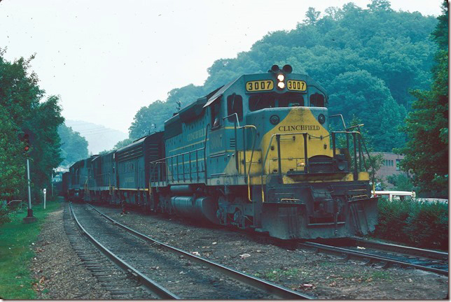 CRR 3007-800-911-2001 pull through the switch at Dante depot onto the passing siding with the Moss Turn. 06-18-1977.