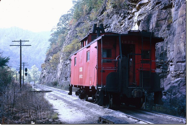 CRR Cab 1072 has been uncoupled and will roll down the main line to the cab track. The conductor is minding the hand brake. Pool Point.