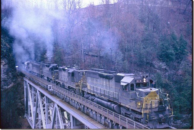 S/b coal train #26 departs Elkhorn with an example of virtually every model on the roster represented: CRR 3003-915-2008-867-905-808-2006-806. 03-24-1970. Pool Point.