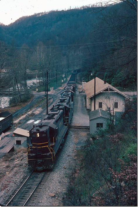 Leased DM&IR SD18s 181-179-190-191 head the Greenbrier Turn n/b at Fremont. 11-12-1977.