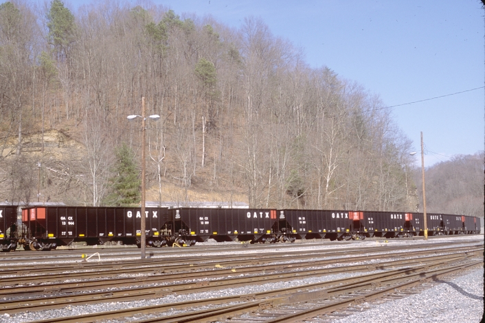 New GACX hoppers lettered "GATX" sit on the main at Loyall Yard waiting to head out to a mine. 3-21-08.