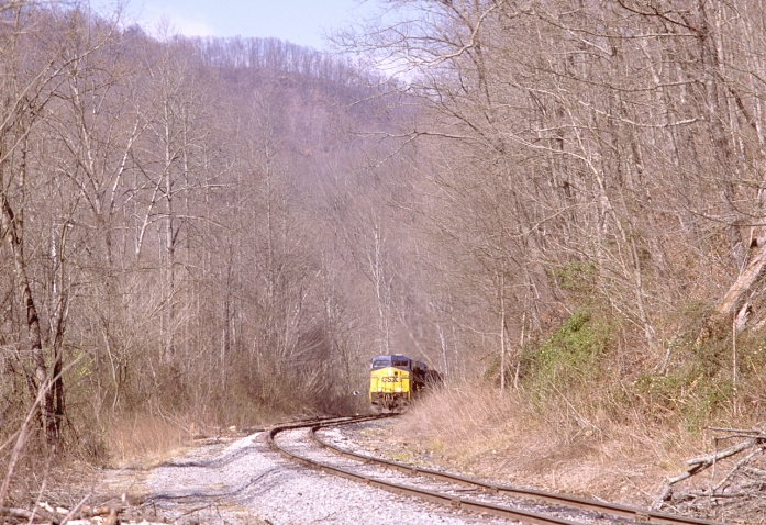 The grade picks up, but that's no problem for the ACs. The spur to the old Bardo tipple branched off to the left and crossed the highway. 