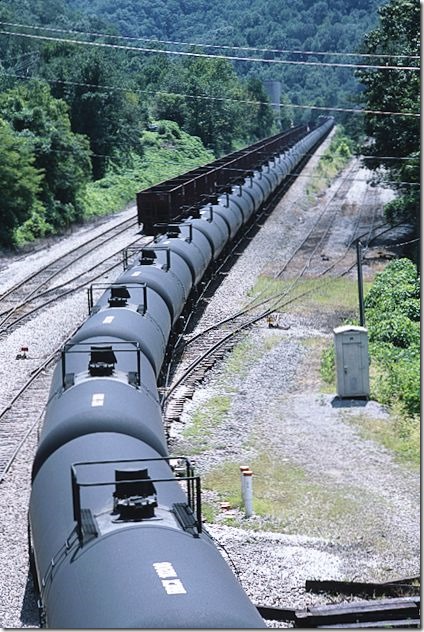 CSX 5492-HLCX 8156-7577 knuckle down on the steep grade at Elkhorn City with 107-car southbound ethanol train K459-09. 8-11-12. View 2.