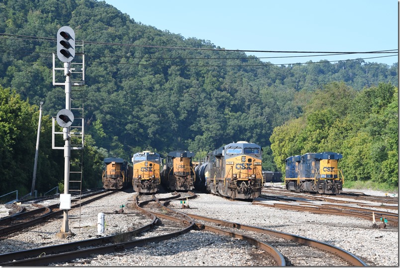 A busy Saturday, 08-24, at Shelby. On the far left is a DPU on a coal train that will soon depart on the main line. No. 844 is on M652 will soon depart after some engine swapping. Also here are CSX 7203, 792, and 7566.