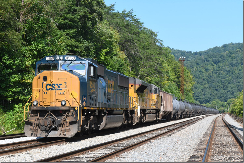 Up at the east end CSX SD70MAC 4550 and UP 9000 await a crew for a s/b ethanol train. Shelby.