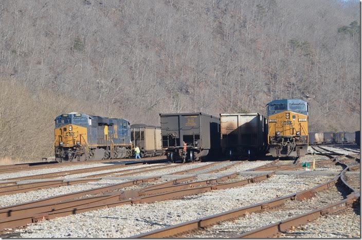 Back at the west end, the Russell crew couples up the DP units, and the outbound Kingsport crew conductor sets up the DP. CSX 980-561 285. Shelby.