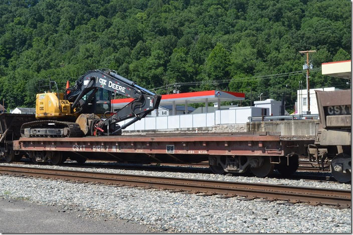 CSX flat 912107 with John Deere backhoe. Danville WV. 06-24-2018.