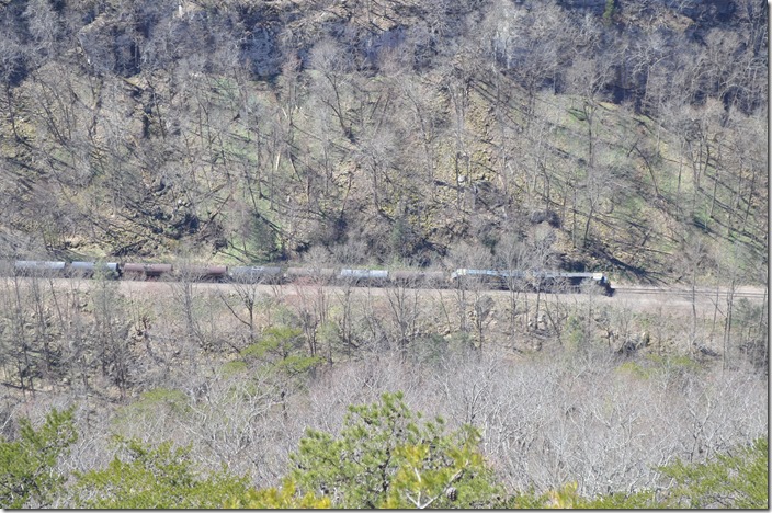 CSX 3144 leads Q692 west through the Breaks gorge with 64 cars on 03-23-2019. CSX 3144. Breaks VA.