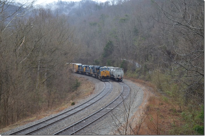 CSX 3358-3450-4507-4548 on Q692-15 w/b is passing an e/b grain train at FO Cabin KY on 02-17-2019.