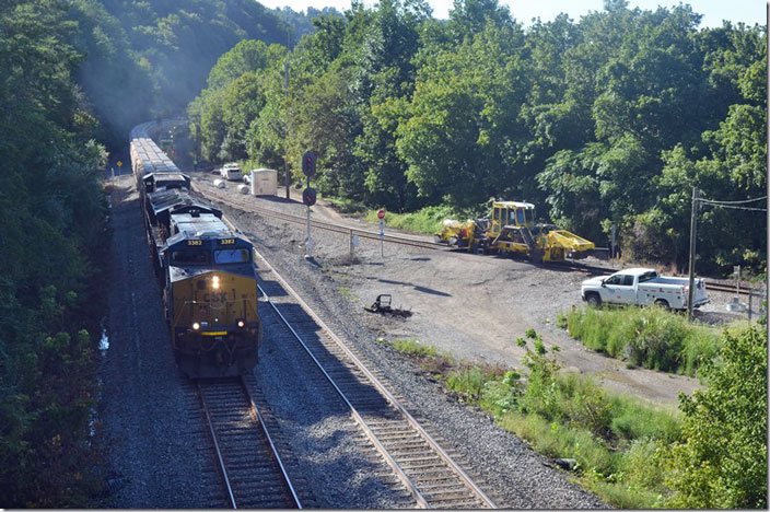 CSX 3382-96 on e/b grain train G904-29 passing tie gang at Coal Run Jct. 09-02-2021.