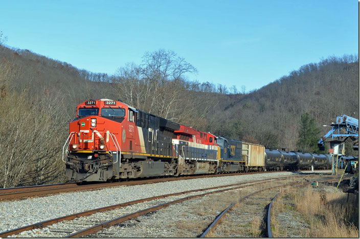 CN 3271-3115-4561 on K468-24 passing a tipple at Lancer (“Bull Creek” on CSX). 11-28-2021.