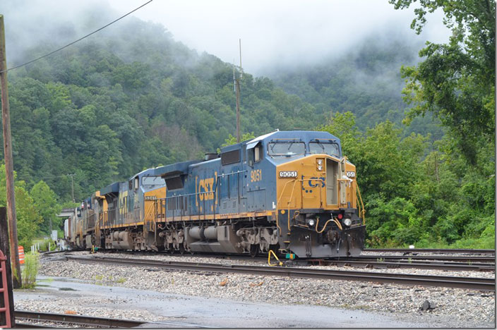 Another train that passed our house with a weird engine. This eastbound freight behind CSX 9051-5341-154-1776 arrived Shelby on 08-11-2022. A C44-8W is rare. I’ve read they have been de-rated to 4,000 HP. They were delivered in 1993-94, and several have been wrecked, retired or sold off. The conductor is walking ahead to align switches into the crowded yard. Shelby.