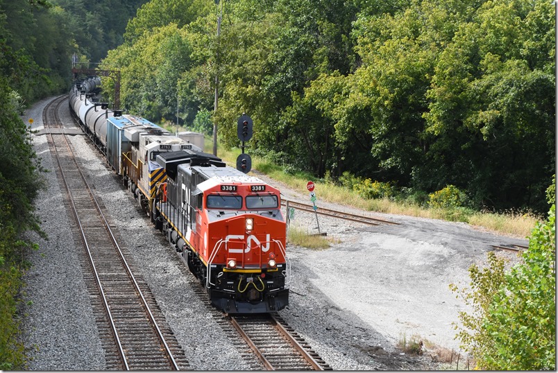 CN 3381-2763 pass Coal Run Jct. on the siding with ethanol train B669-12 (Clearing Yard Chicago to Wadesboro NC Winston Salem Southbound RR). 09-13-2024.