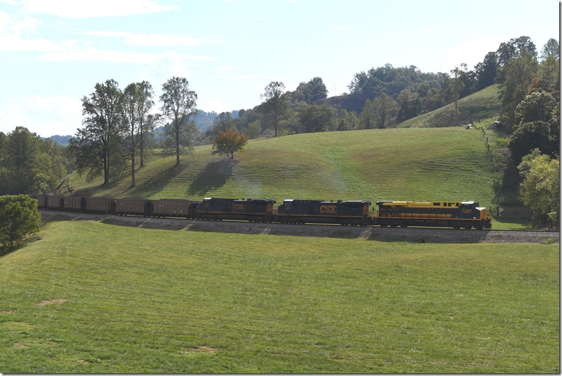 We shot R243 going from Shelby to Martin on Friday, 09-2022, with 110 DKPX MTYs. On Sunday, 09-2022, the R280 job has picked up the loaded train at Martin and is returning to Shelby. The train loaded at one of the mines in the EK coal district (L&N). R280 has just left Martin Yard on the Big Sandy Extension (fka E&BV SD). CSX 1900-7384-7233. Arkansas.