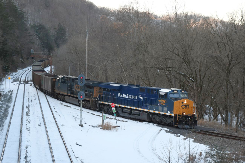 "Pan Am" 1981 and CSX 543 pull onto the Coal Run SD on 01-20-2025 with E912 (Russell-Coal Run). A mine run crew out of Shelby will take this train to Scotts Branch Mine later.