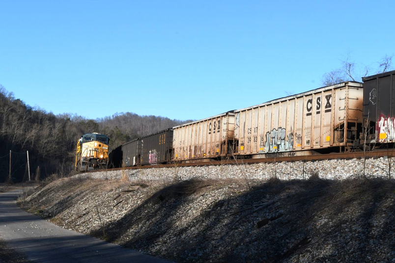 L200 is slowing to a stop along Back Bottom Road at Shelby. Back Bottom used to be inhabited with several houses and railroad structures, but no more.