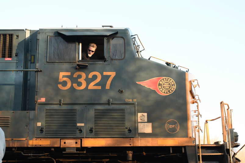 Christian knows the Kingsport engineer, but I can't remember his name. The WM "Fireball" logo looks good. It was applied to the steam loco tenders in later years, as well as first-generation diesels. CSX 5327 is an ES40DC, not an AC.