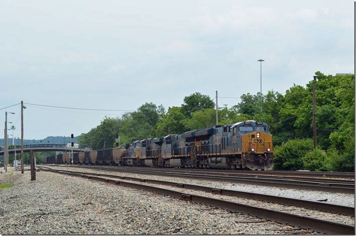 CSX 3273-3443-3077-356 rumble westbound with a long string of empty tubs for the coal fields. The scale is on the left. Now we head to the antique mall. 06-18-2021. S Charleston WV.