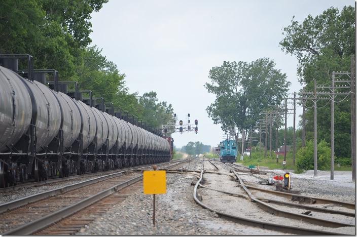 On the right are the sidings for National Lime & Stone and the W&LE interchange. K081 has an approach signal because he is following Q135. CSX 3117-790. Carey OH. View 2.