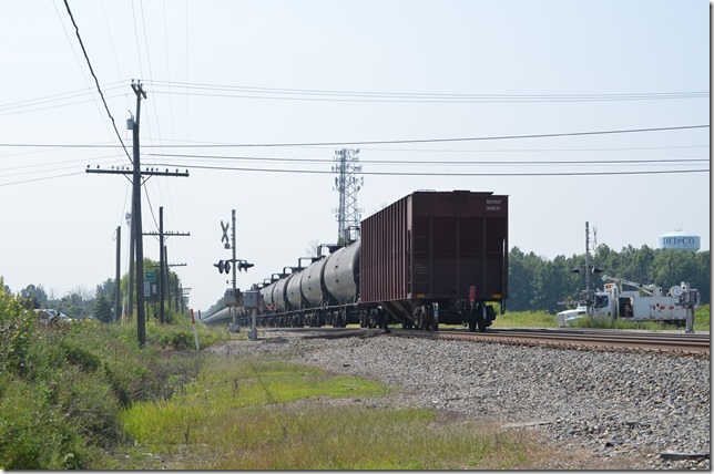 BNSF covered hopper stenciled “spacer car”.