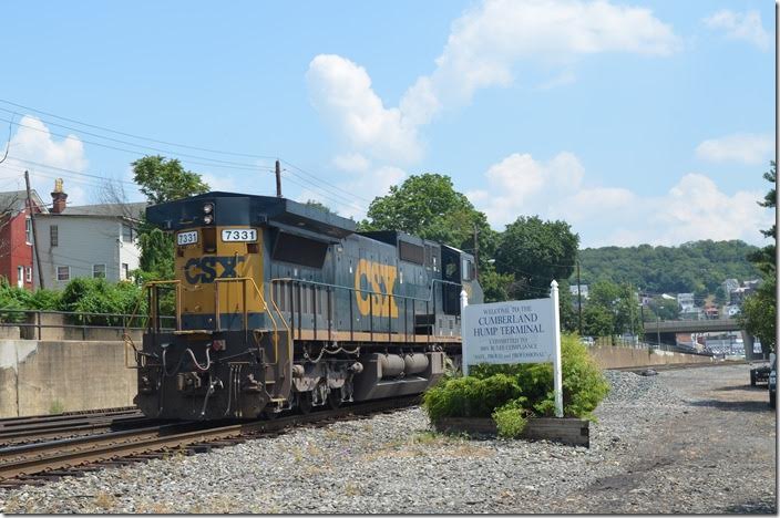 CSX single unit 7331 backs west of the signal on the Mountain SD. CSX 7331. Viaduct Jct.