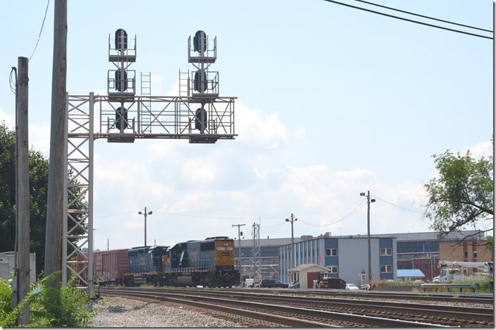 CSX 8617-6544 switch the west end of the yard at Virginia Avenue. The blue building is the yard office. The loco shop is in the background. Virginia Ave. Cumberland MD.