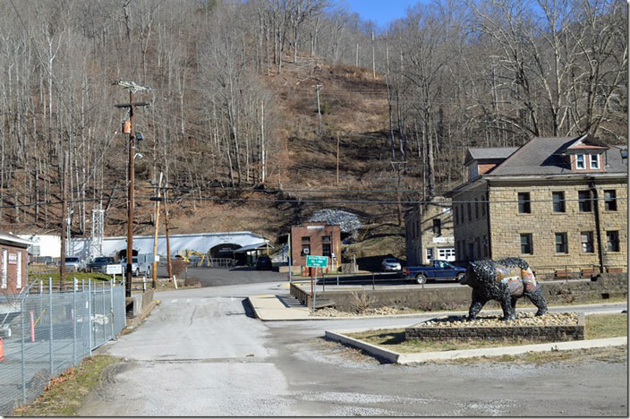 Looking across the street at Portal 31. To the right is the former lamp house (now gift shop), the fire department, and former office building/bath house. https://www.portal31.org/ USS Lynch.