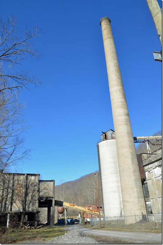 Old tipple on left. Tall smoke stack for power house on right. USS Lynch.