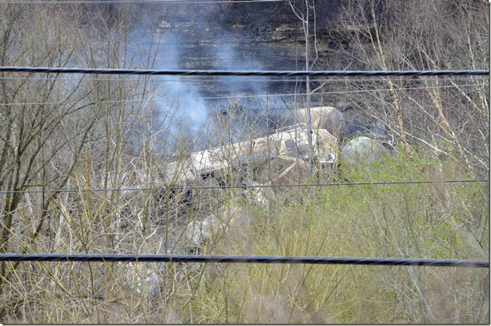 You can make out two locomotives and tank cars. I have no idea what the engine numbers were