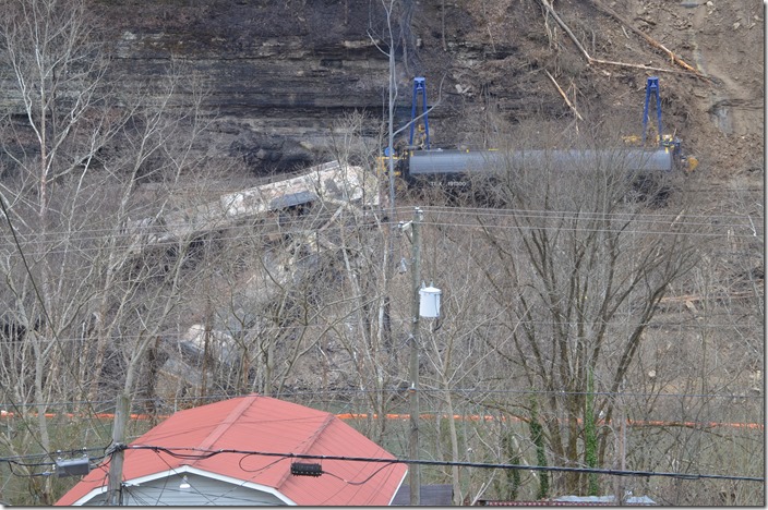 Sidewinders moving a tank car. View 2. CSX derailment. Draffin KY.