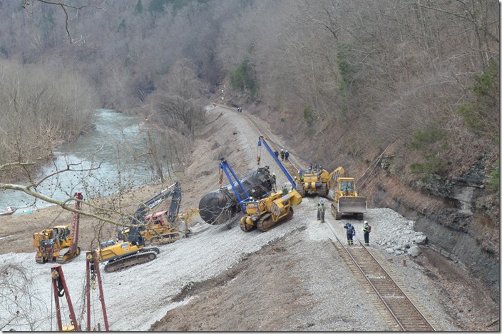 Moving the tank car TILX 191300 down the slope to the storage area. CSX derailment. Draffin KY.