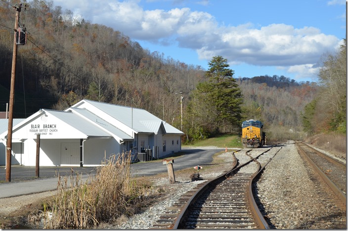 Pusher 3197 was parked on this short siding at Isom on the Rockhouse SD. It is used to push eastbounds from Deane to Beaver Gap on the former C&O Elkhorn & Beaver Valley SD. CAM Mining at Deane was working, and the E&BV looked to have seen a recent train heading to Martin. CSX pusher 3197. Isom.