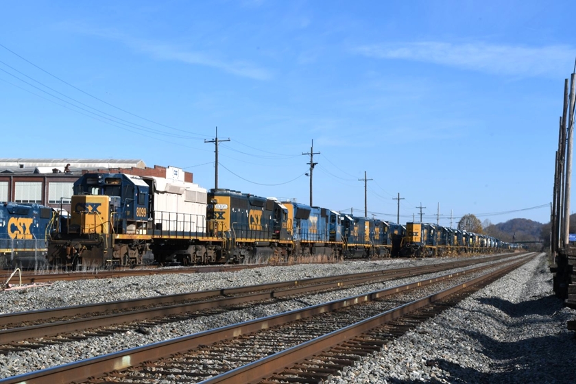 A long line of stored EMD units beside the main line. 11-30-2024.