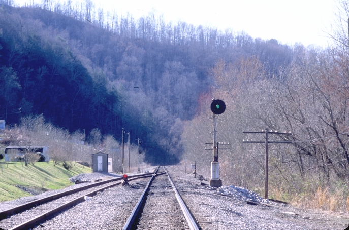 Heading east on US 119, I heard a train leaving Loyall Yard.  I set up at Wilhoit, the end of a controlled siding that extends north from the yard. 