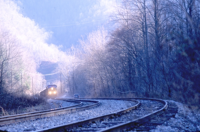 The scanner revealed a shifter working up the Clover Fork Branch.  I took KY 38 out of Harlan, and found the crew working the Kentucky Cumberland Coal at High Splint.  CSX 777-14 had just loaded 30 and were bringing them down off the hill.