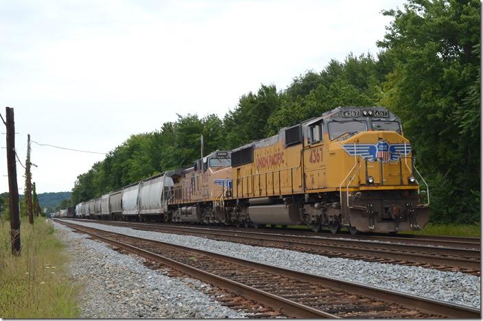 UP 4367-5950 with an eastbound freight is parked west of RJ Cabin on Track 1 with no crew.