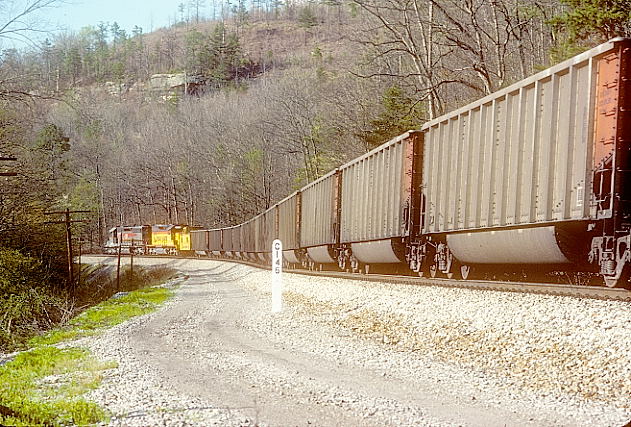 Hazel. Southbound coal train of SJRX tubs is heading for Jacksonville Electric Authority.