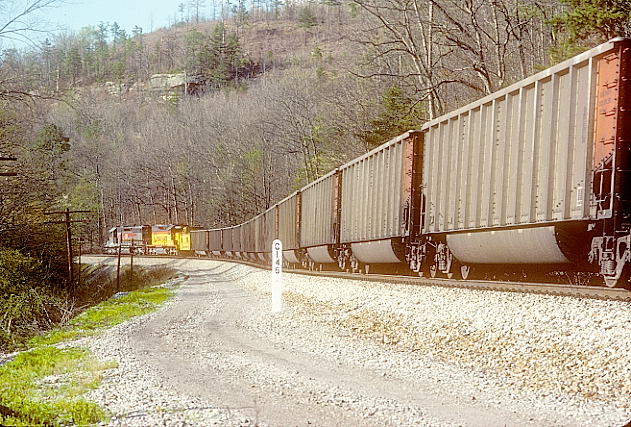 Hazel. Southbound coal train of SJRX tubs is heading for Jacksonville Electric Authority.