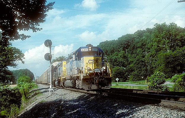 Patch. CSX SD40-2s head southbound multi-level train Q245 (Detroit-Jacksonville) at North Bourne.