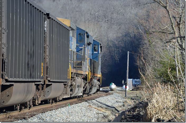 CSX 3107-139 on Track 1 cuts off several loaded hoppers and sets them over to Track 2 leaving one. That dwarf never displayed anything but red! CSX 3107-139. Henlawson WV.