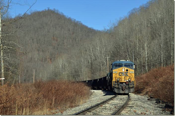 At Lorado WV, I found CSX pusher 745-108 waiting for head end engine 321 to pull under the load-out at Greenbrier Minerals.